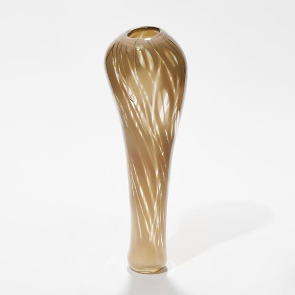soft fawn brown and transparent tall vase with widening bulbous top with see through sections hand made from glass