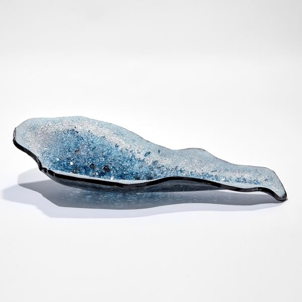 abstract oyster shell shaped sculptural platter filled with fine crystals in light grey turquoise and blue hand made from glass