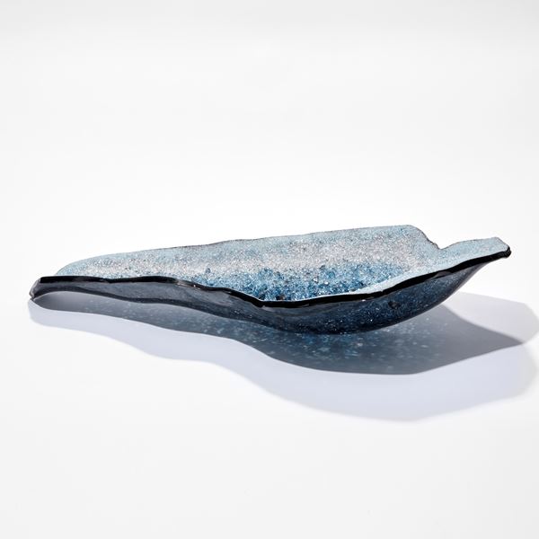 abstract oyster shell shaped sculptural platter filled with fine crystals in light grey turquoise and blue hand made from glass