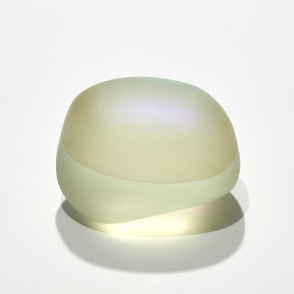 satin smooth finished soft yellow pebble with inner colours glowing outwards hand made and sculpted from cast glass