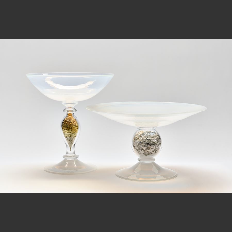 clear and milky white venetian inspired centrepiece with flared top and centre stem filled with silver leaf handblown from glass