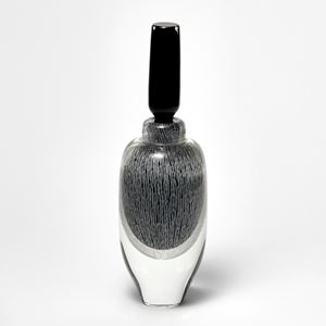 clear black and white large bottle with black stopper and internal fine pattern hand blown from glass