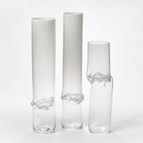 hand blown clear cylinder with offset upper section and mid way rippling and flared waisted joint section