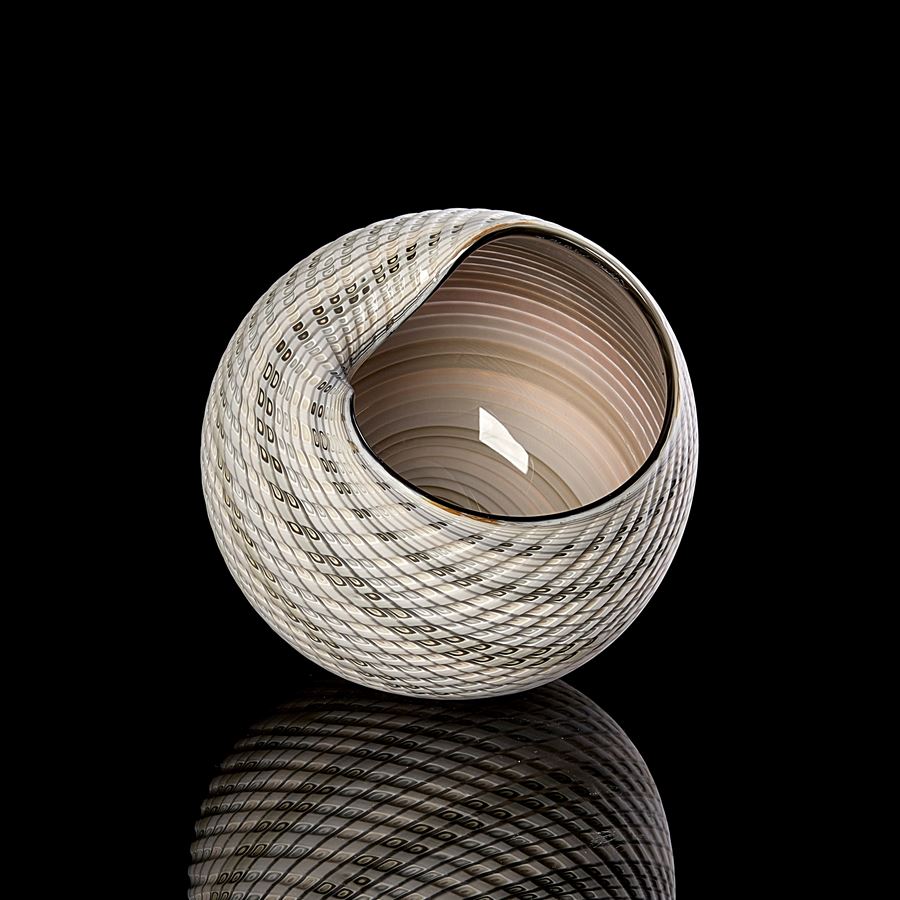 round shell like vessel with undulating opening edge matt cut exterior in white grey and soft blue with shiny bronze brown interior hand made from glass