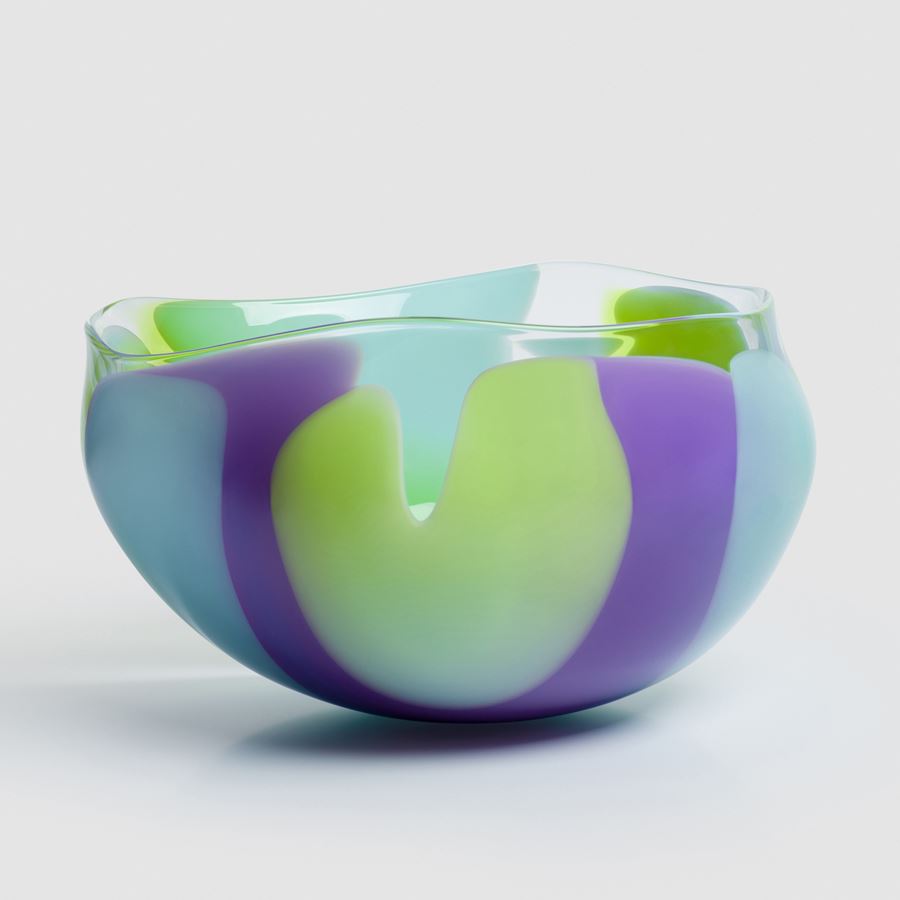 abstract amorphic hand made clear glass centrepiece with chunky soft curved bands of colour in opaque lime purple and dove blue