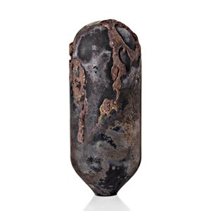 tall standing black and rust coloured sculpture with rounded top and tapered base covered in an organic sprawling surface texture hand made from glass