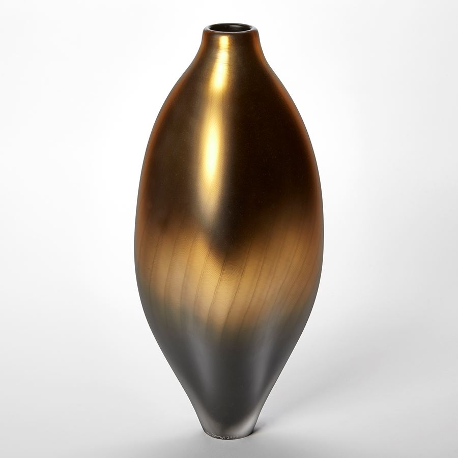 tall soft oval standing vessel with small opening at the top in metallic gold bronze and grey handmade from glass