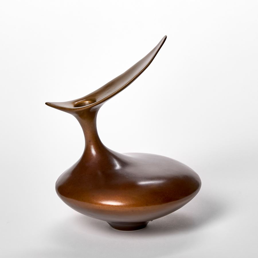 bronze sculpted vessel in bird like form