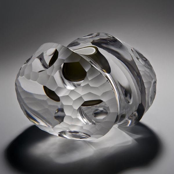 modern minimalist glass artwork in light grey with rock like quality