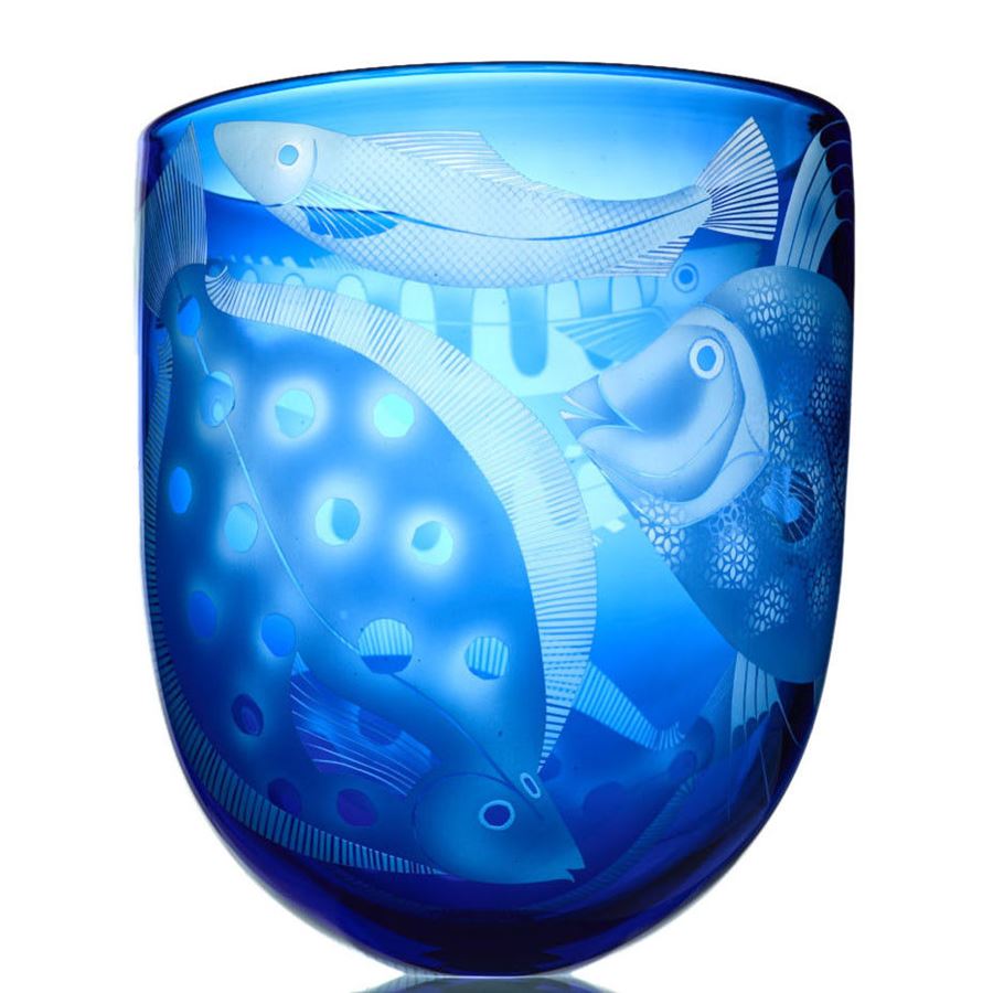 blue glass ornament with sandblasted fish shapes