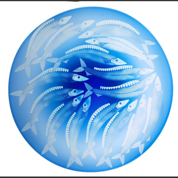 blue glass plate ornament with wihte fish decoration
