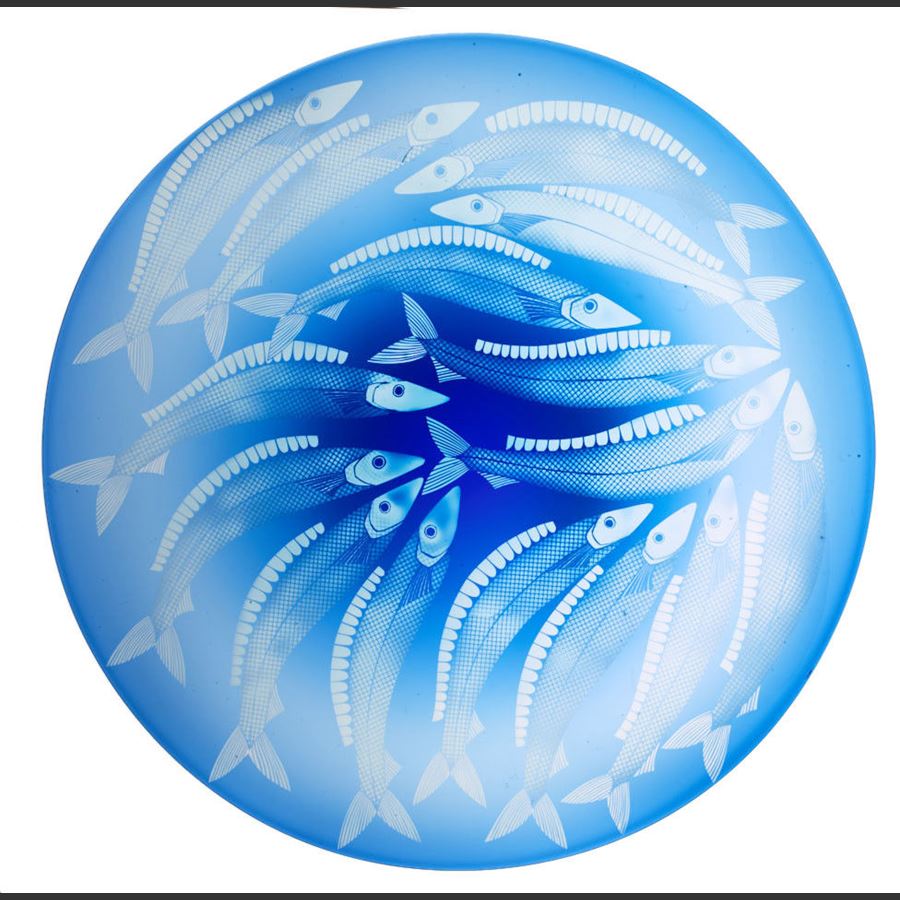 blue glass plate ornament with wihte fish decoration