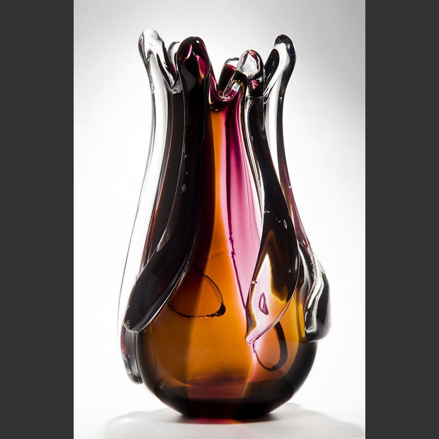 art glass vase in flame shape in dark orange red brown and purple