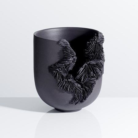 porcelain art sculpture of bowl with frayed open end in black