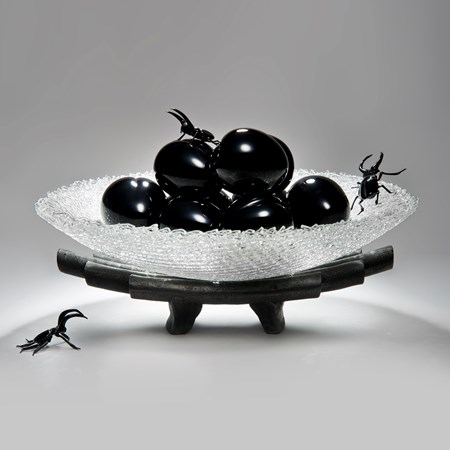 modern art-glass sculpture of bowl with peaches on cermaic base with glass beetles