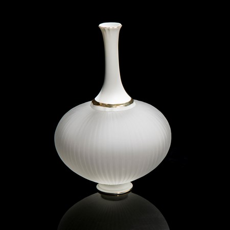 white glass and ceramic sculpture with wide base and long neck