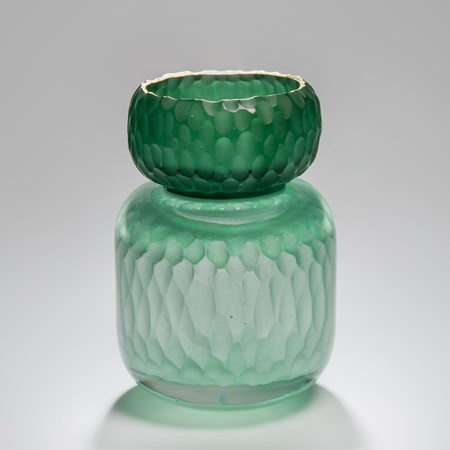 green sculpted glass jar artwork
