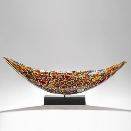 circular patterned handblown intricate glass sculpture in concave shape 