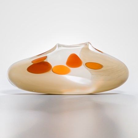 short art glass vase in cream with orange circles 