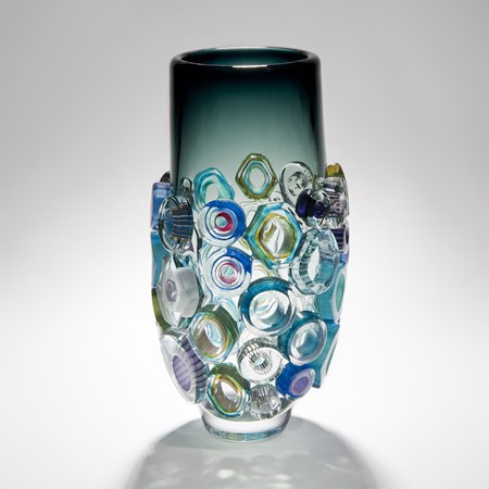 green handblown art glass vase with external adornments