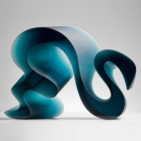 abstract contemporary glass art sculpture of a squiggly line in jade 