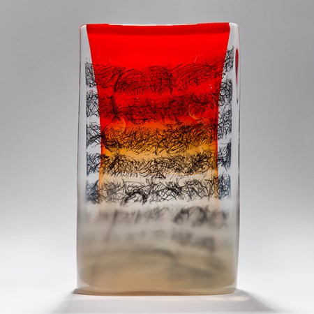red black clear and taupe rectangular solid glass manuscript tablet sculpture with erratic scribbled black lines