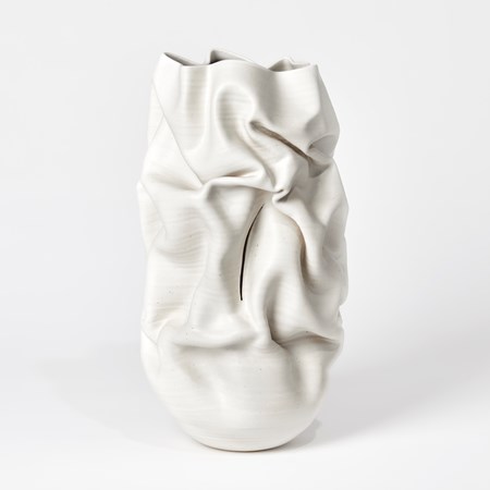 cream crumpled tall vessel with slash handmade from clay