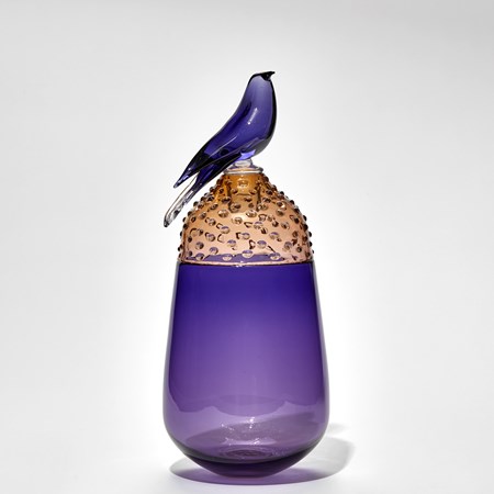 purple and bronze pear shaped jar with spotty domed lit with purple bird on top hand made from glass
