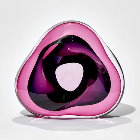 pink and purple hazy soft shaped sculpted hand made from glass with central opening