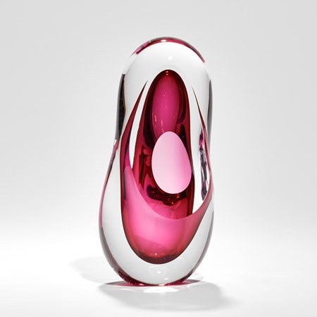 clear and pink amorphous tall soft and rounded sculpture hand made from blown glass