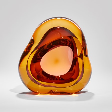 brilliant gold and rich orange red amorphous sculpture with front opening hand made and sculpted from glass