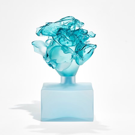 low frosted turquoise box with upper clear aqua abstract floral cluster perched on top hand made from glass