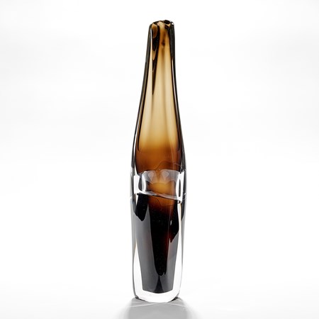 tall amorphous dark brown vase fading in colour to the top with a central clear band hand made from glass