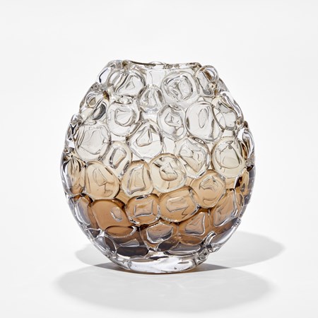 small oval hand blown glass vase covered in oversized bubbled with transparent top fading to fawn and dark brown