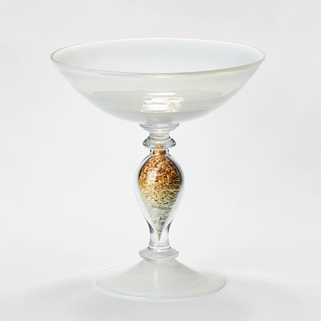 handblown traditional venetian style centre piece with detailed stem and flared bowl on top in clear and white glass with the undulating central stem filled with gold leaf 