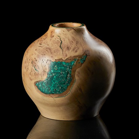 round turned london plane tree wooded vessel with smooth surface with areas filled with malachite resembling a globe with islands and continents