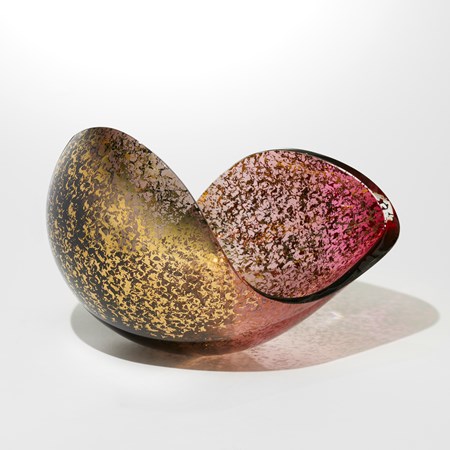 open topped ovoid sculpture with elliptical curved rim made from transparent pink and purple glass with a gold organic texture on the outside