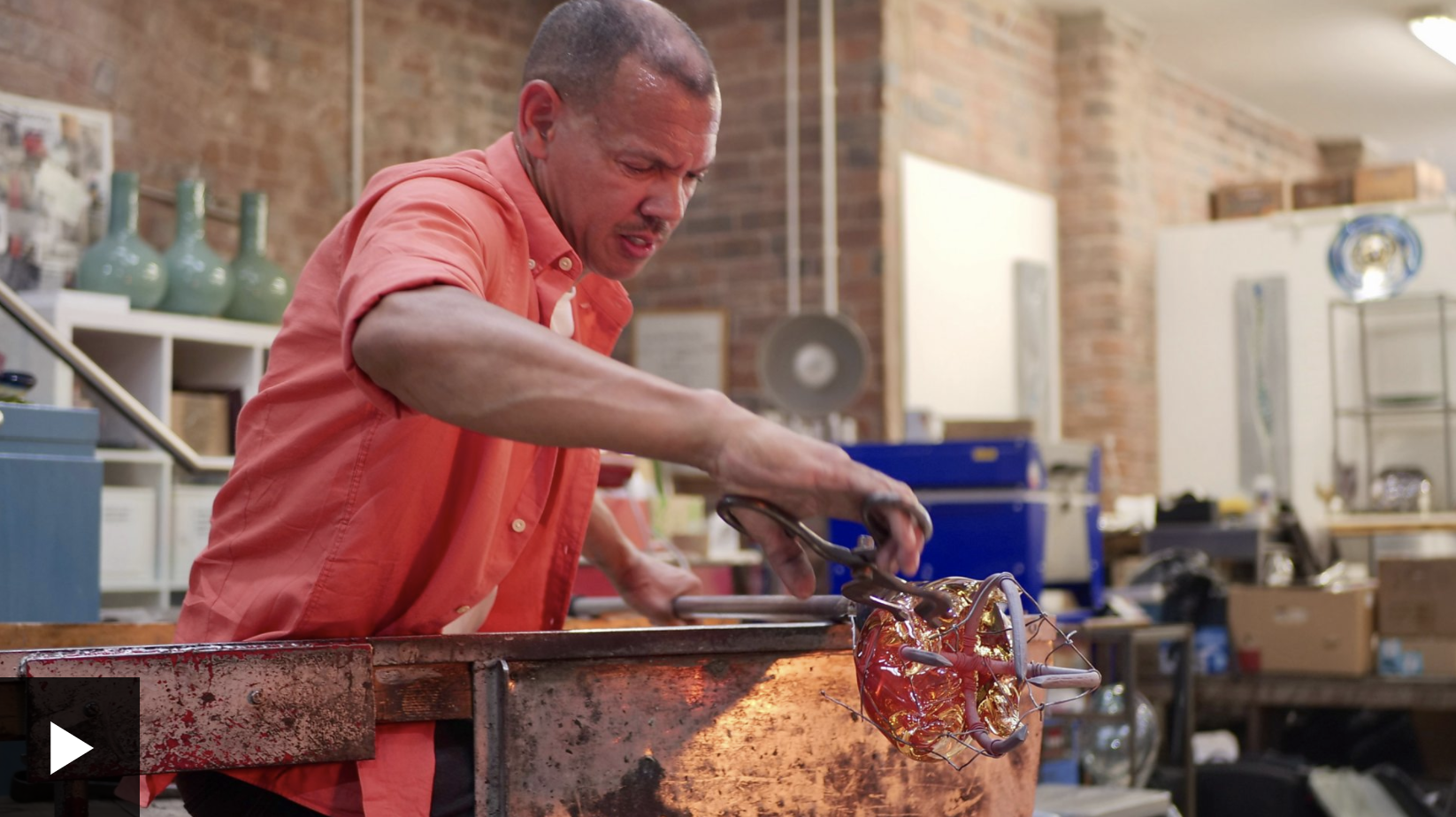 artist chris day making blown glass sculpture in workshop