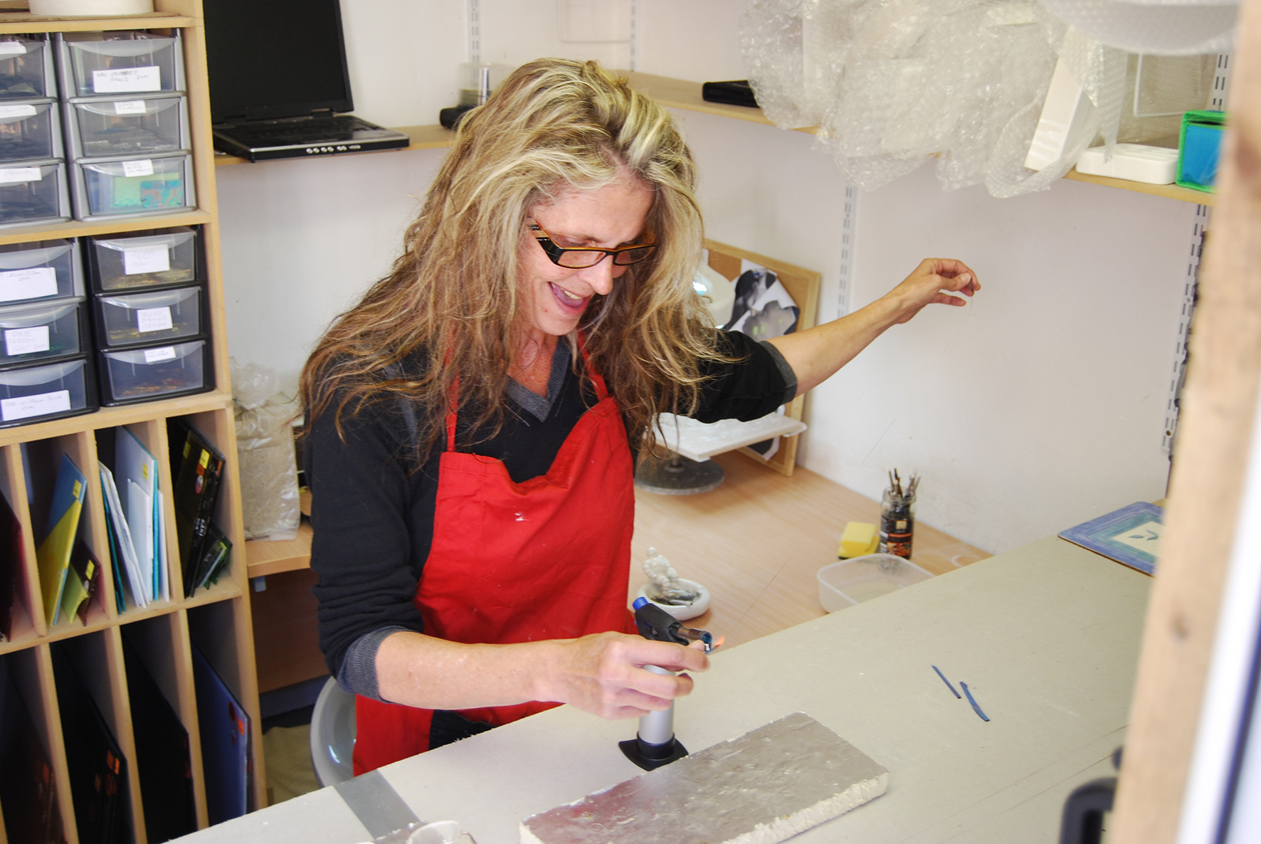 architectural glass art artist laura hart at work in studio