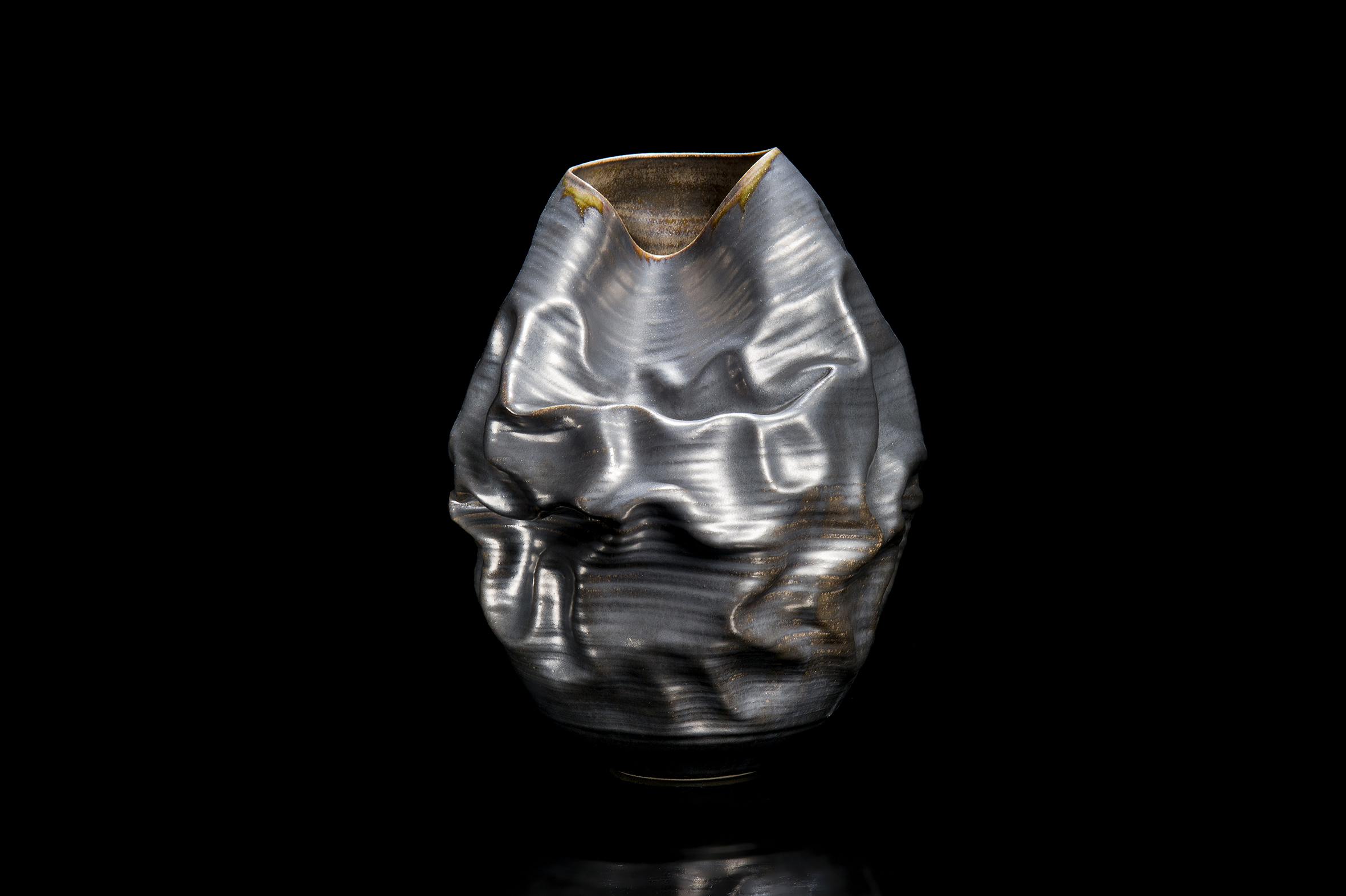 crumpled black art ceramic vase art sculpture Nicholas Arroyave-Portela