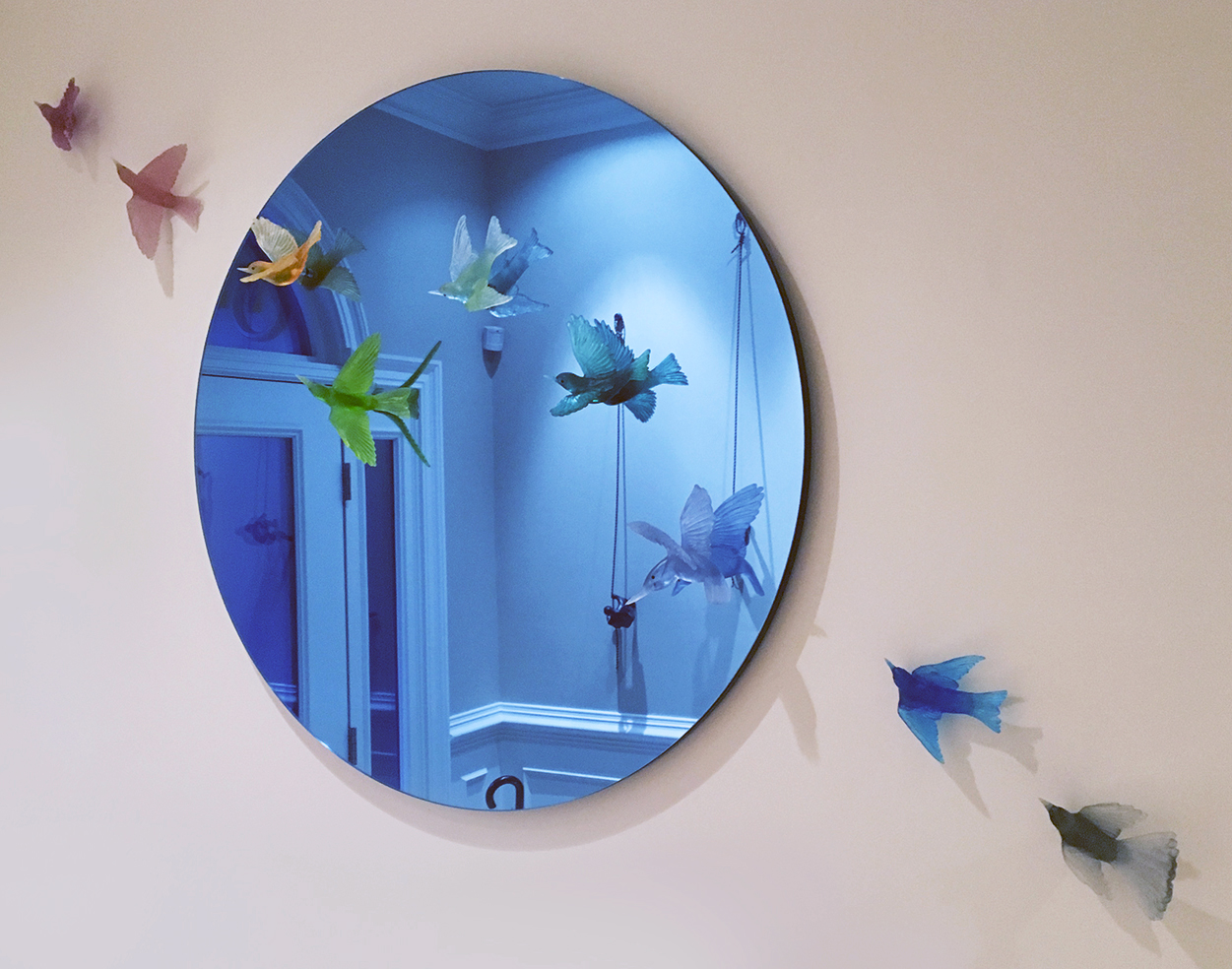 decorative halllway mirror with lukeke designer bird sculptures