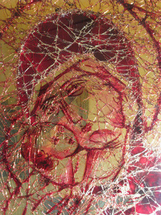 modern glass art pane depicting virgin mary and baby jesus in yellow and red