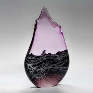 abstract teardrop shaped blown glass sculpture in pink and black swathes