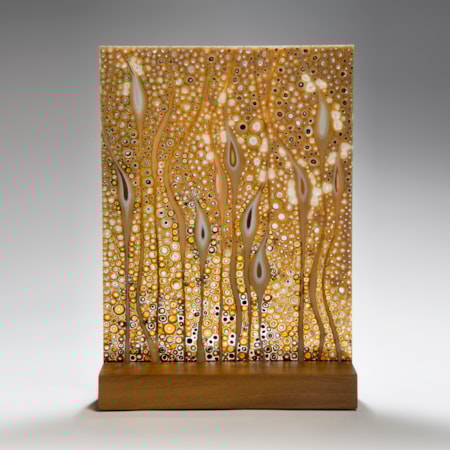 large fused glass art panel of flowers in gold