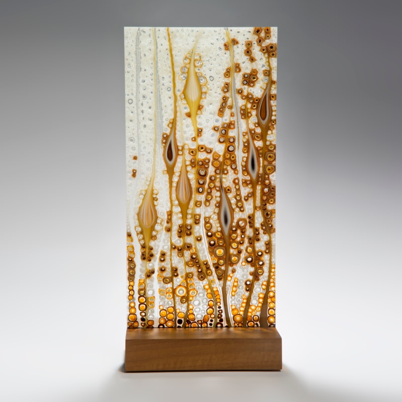fused glass panel inspired by nature with walnut base