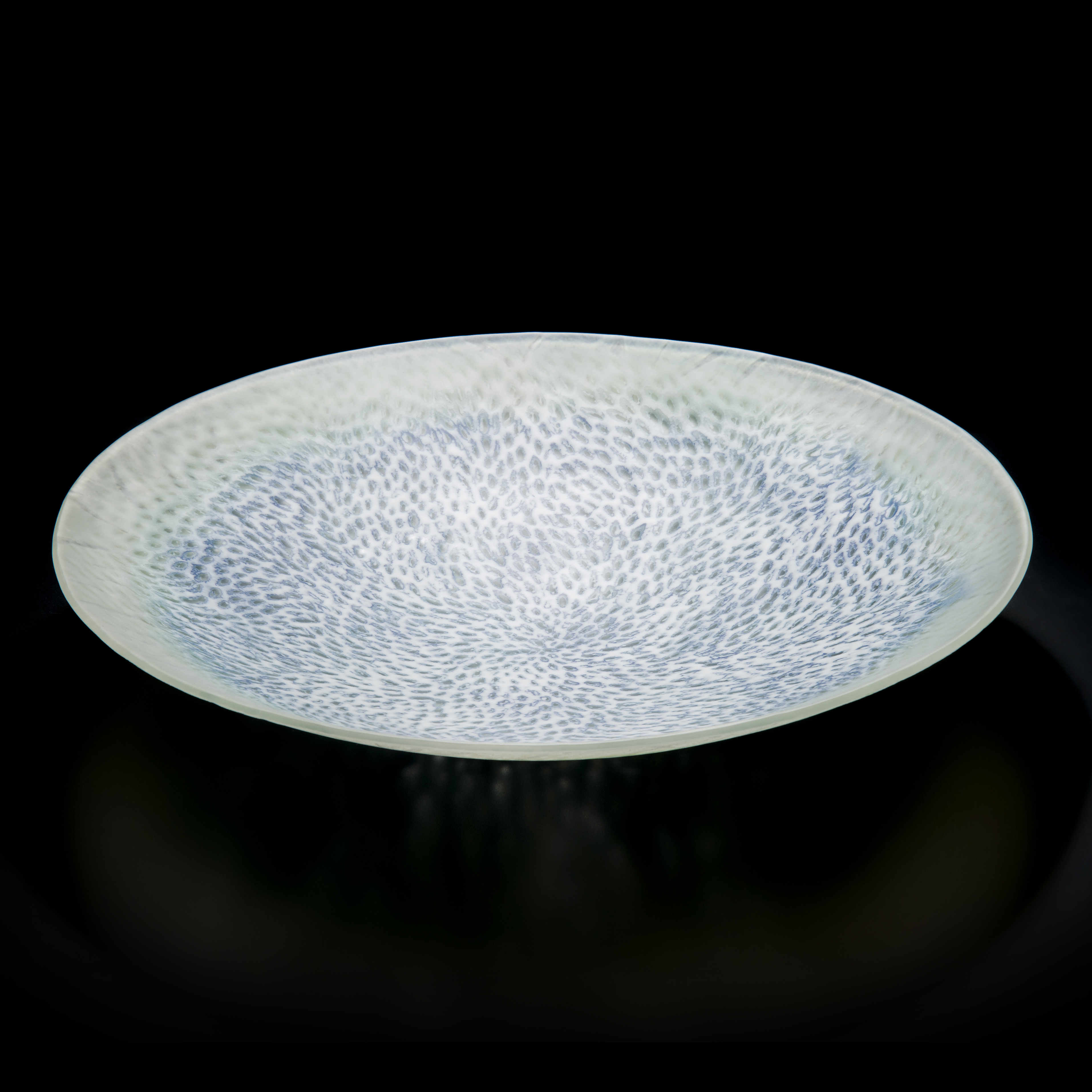 art glass sculpted tray in white with faint light blue speckles