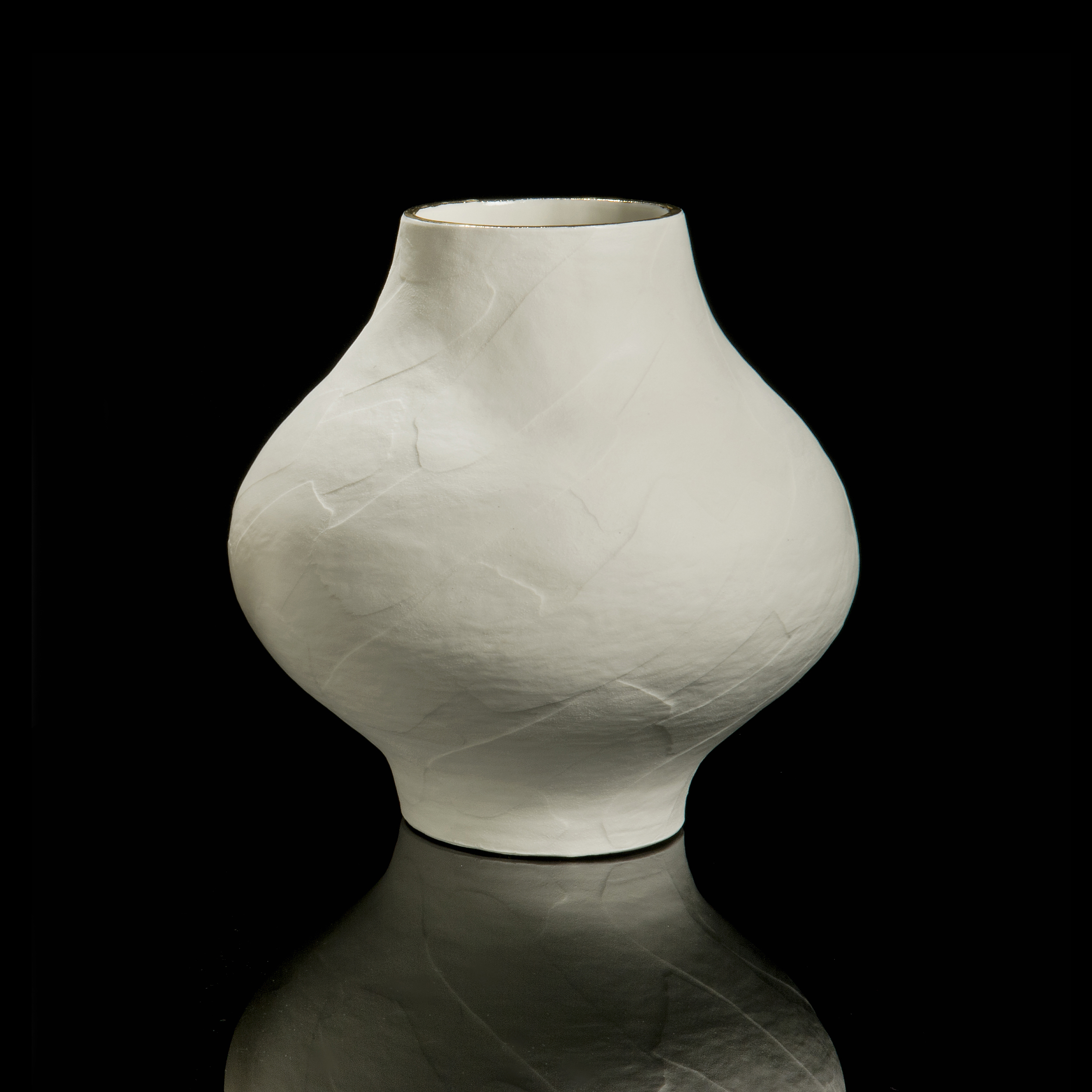 ceramic centrepiece vessel sculpture with narrow top and bottom and wide midrange