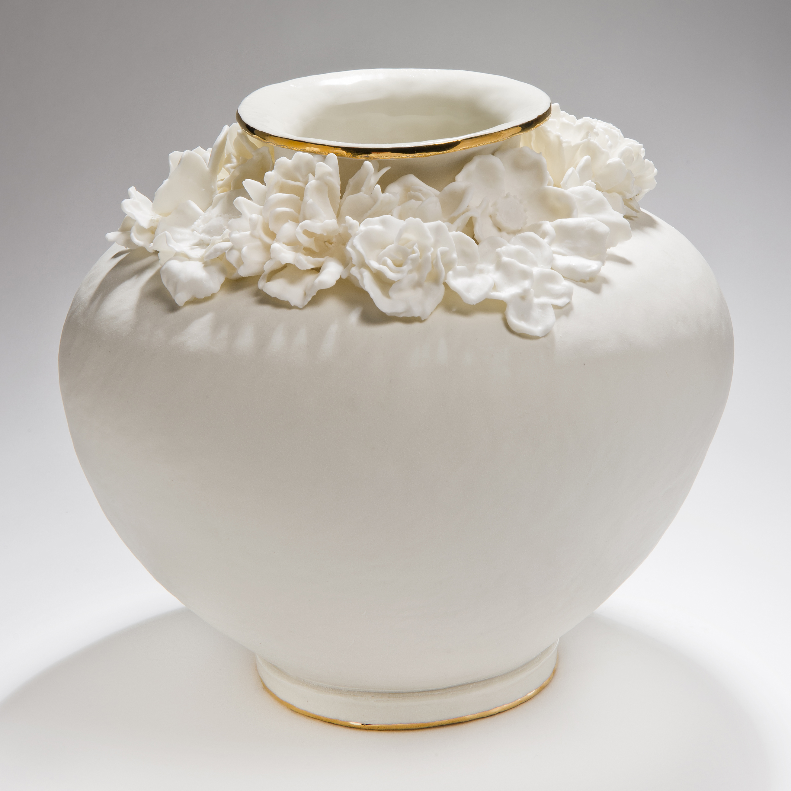 large round porcelain vase with gold lustre and floral decoration