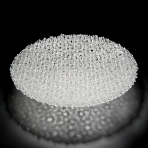 concave mesh bowl-shaped modern art-glass sculpture in crystal
