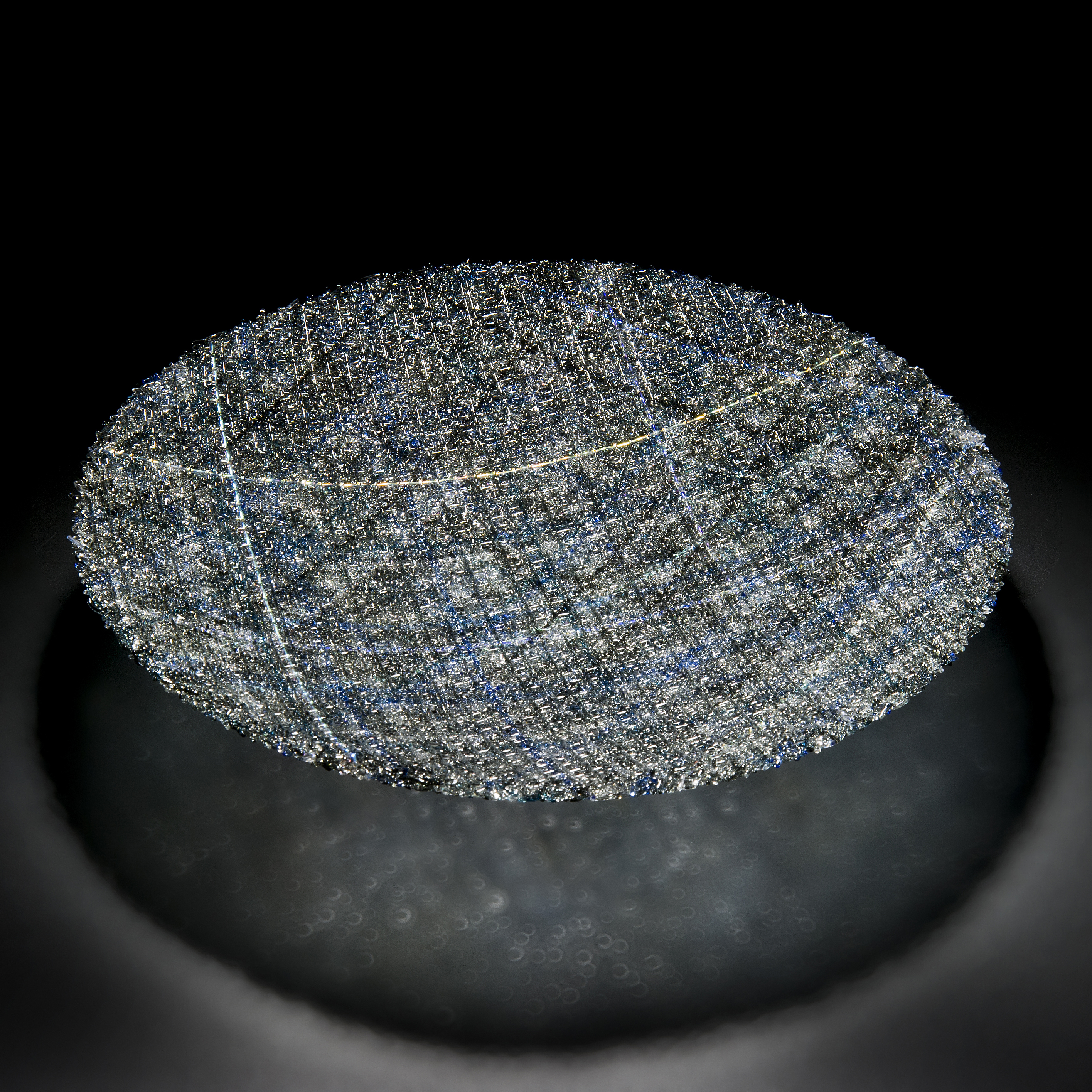 modern fused art-glass sculpture of diorama in blue black and white